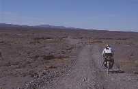 Cycling across the lava field between Dreki and Her&eth;ubrei&eth;arlindir