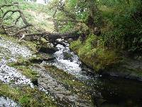The narrow channel running into the pool